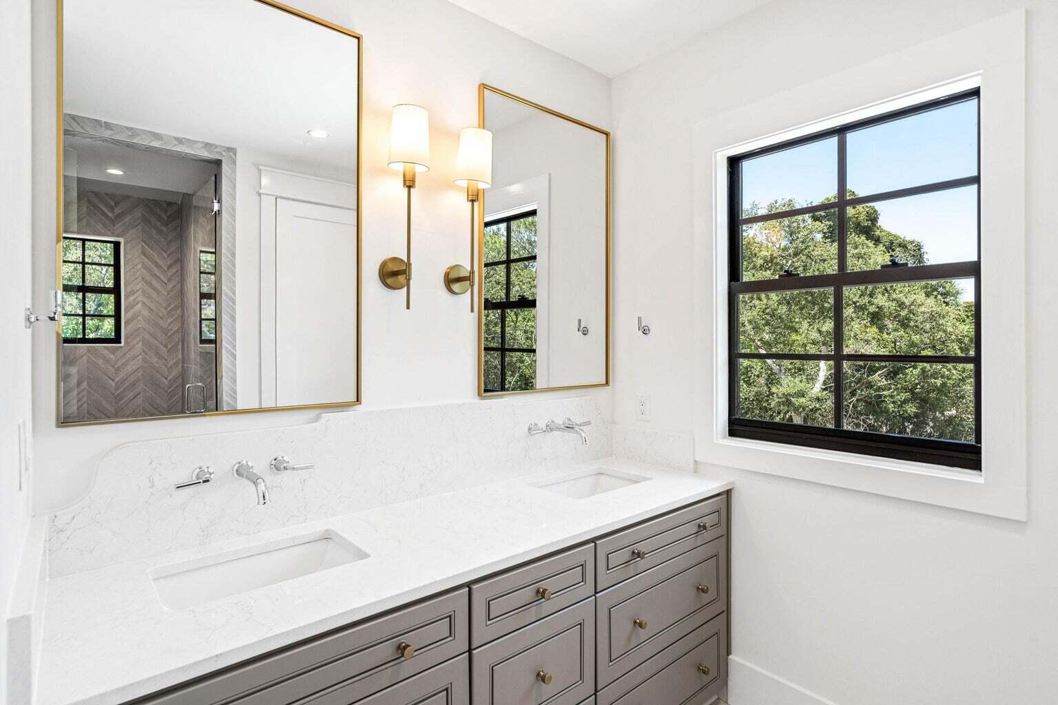 18 Seabreeze Place Seacrest, FL 32461 - Photo 30 of 41 a bathroom with a sink and a large mirror