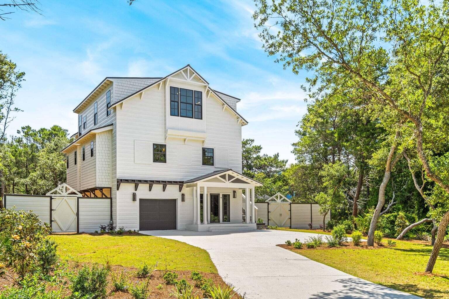 18 Seabreeze Place Seacrest, FL 32461 - Photo 3 of 41 a view of a white house with swimming pool in front of it