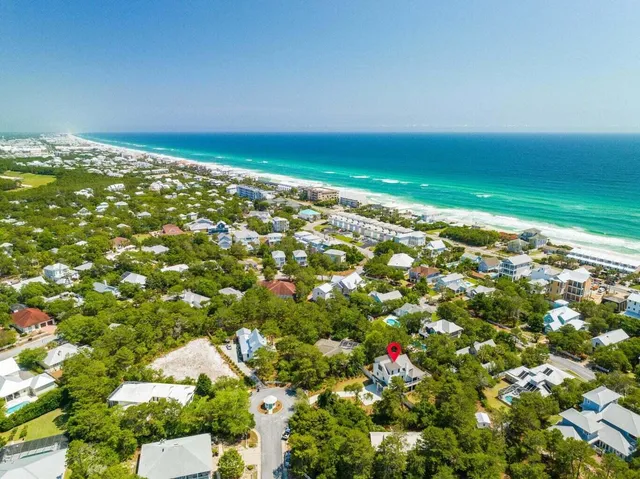 a view of balcony with wooden floor