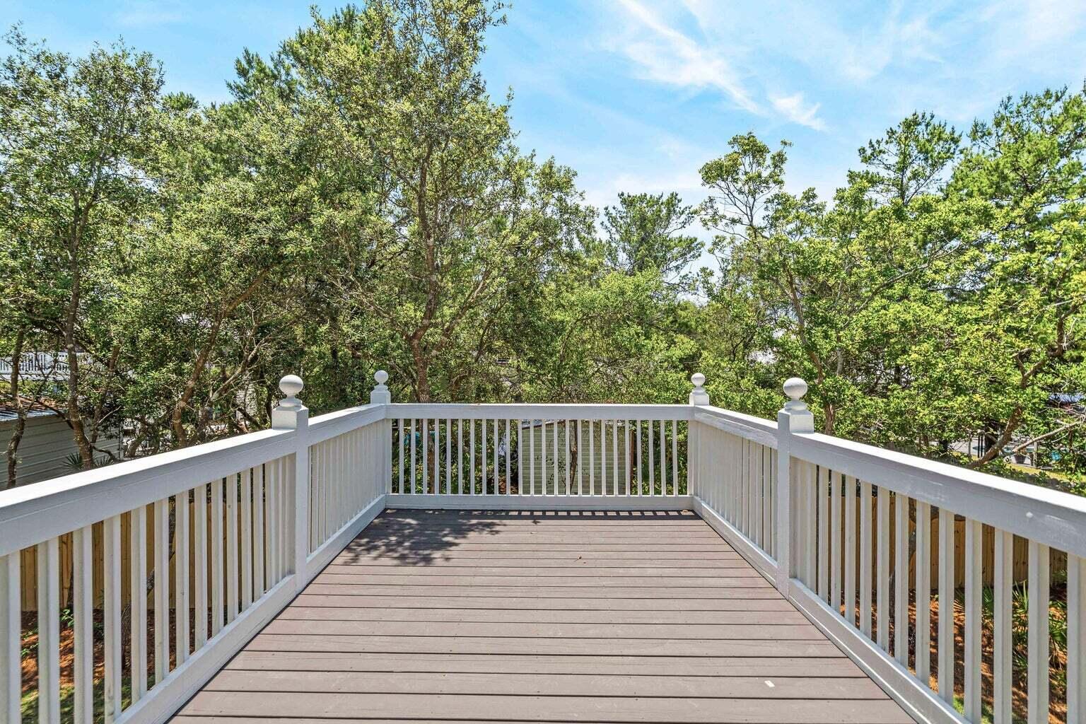 18 Seabreeze Place Seacrest, FL 32461 - Photo 38 of 41 a view of balcony with wooden floor