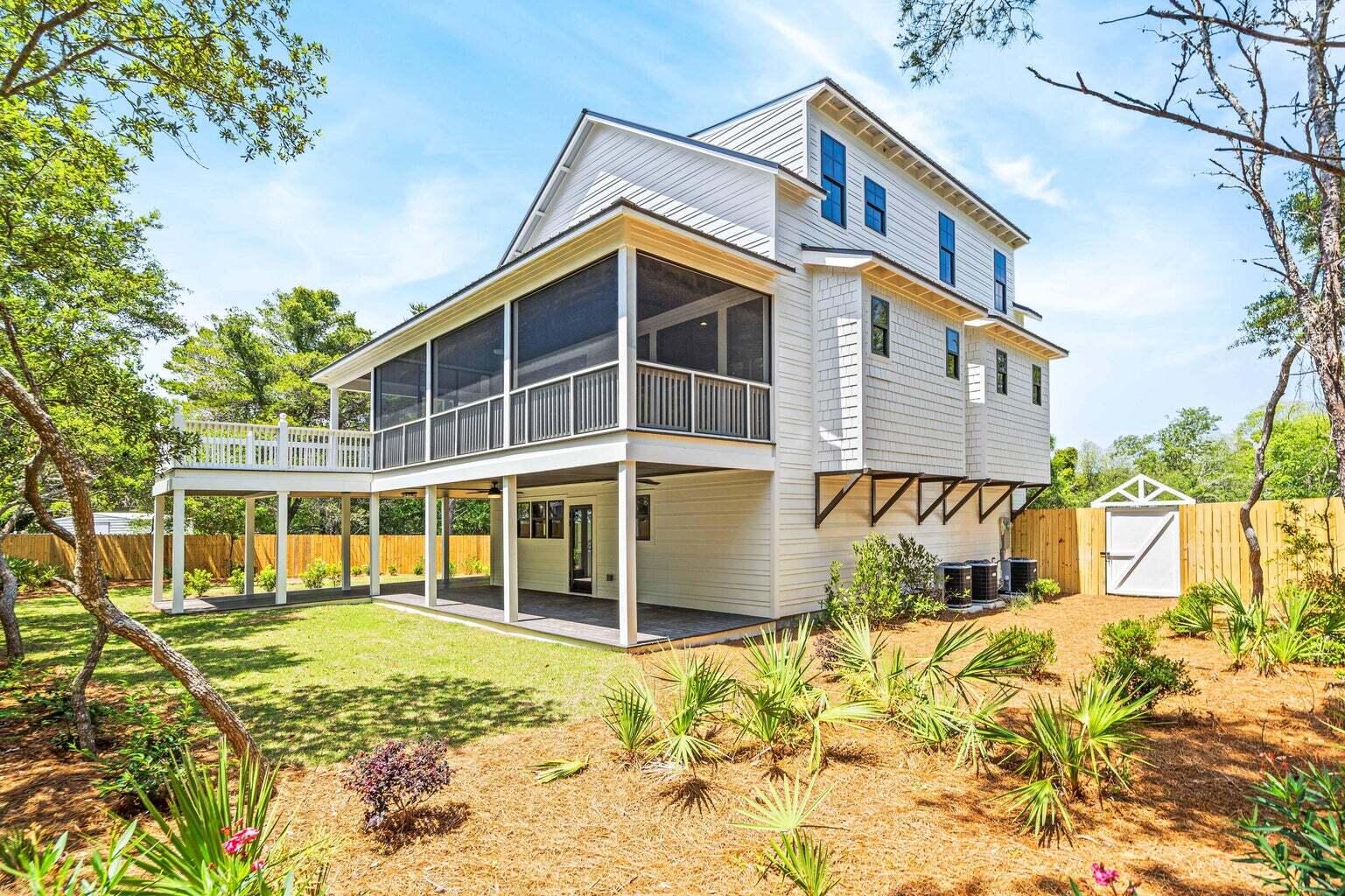 18 Seabreeze Place Seacrest, FL 32461 - Photo 10 of 41 a front view of a house with a yard