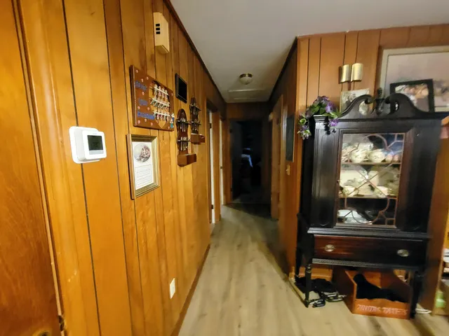 a view of a living room with a wooden floor