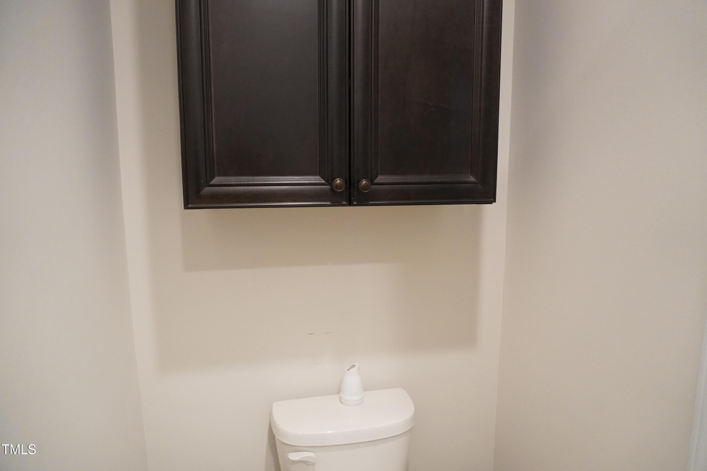 1850 Gillburg Road Henderson, NC 27537 - Photo 13 of 31 a bathroom with a toilet