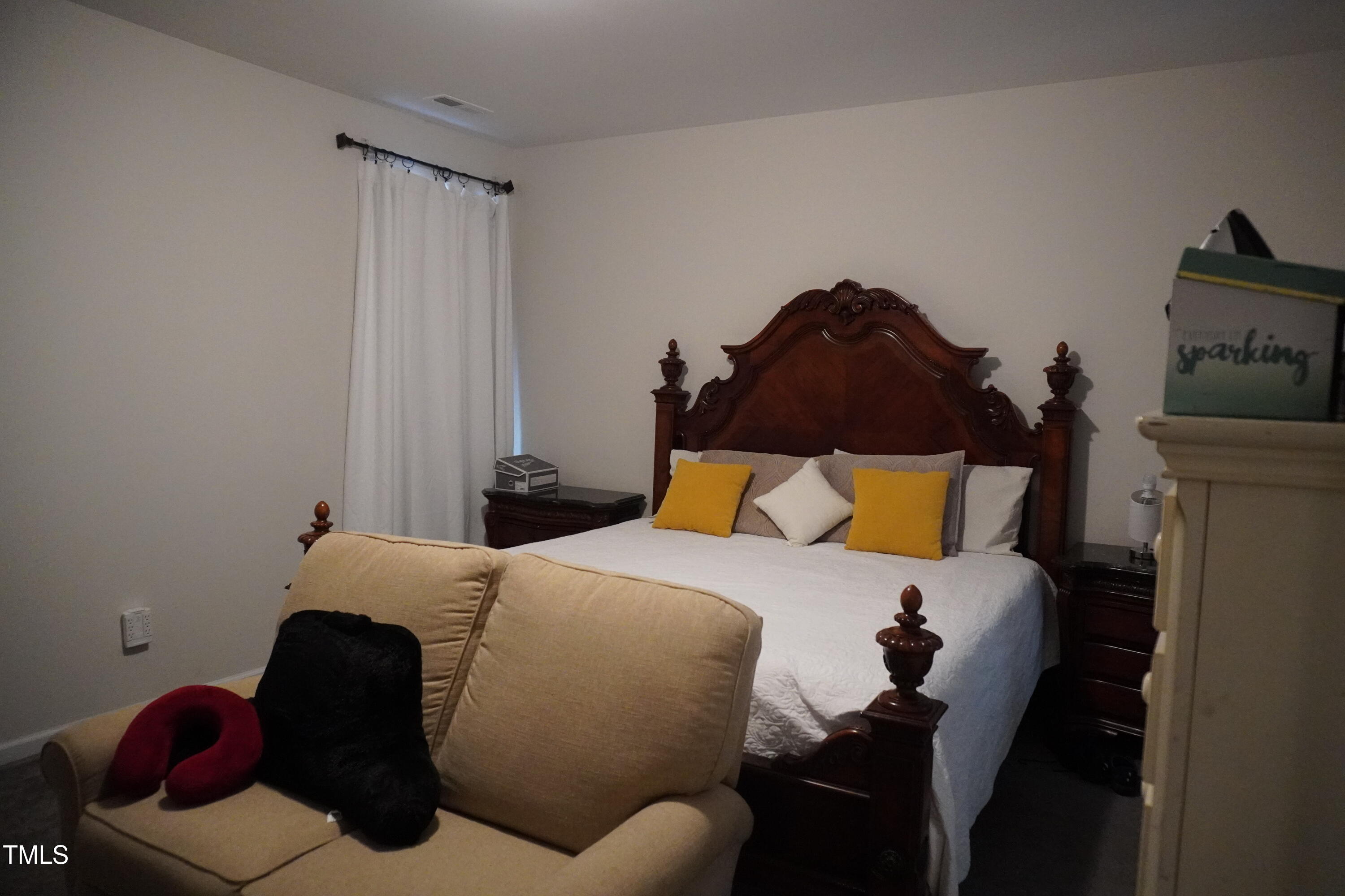 1850 Gillburg Road Henderson, NC 27537 - Photo 29 of 31 a bedroom with a bed and window