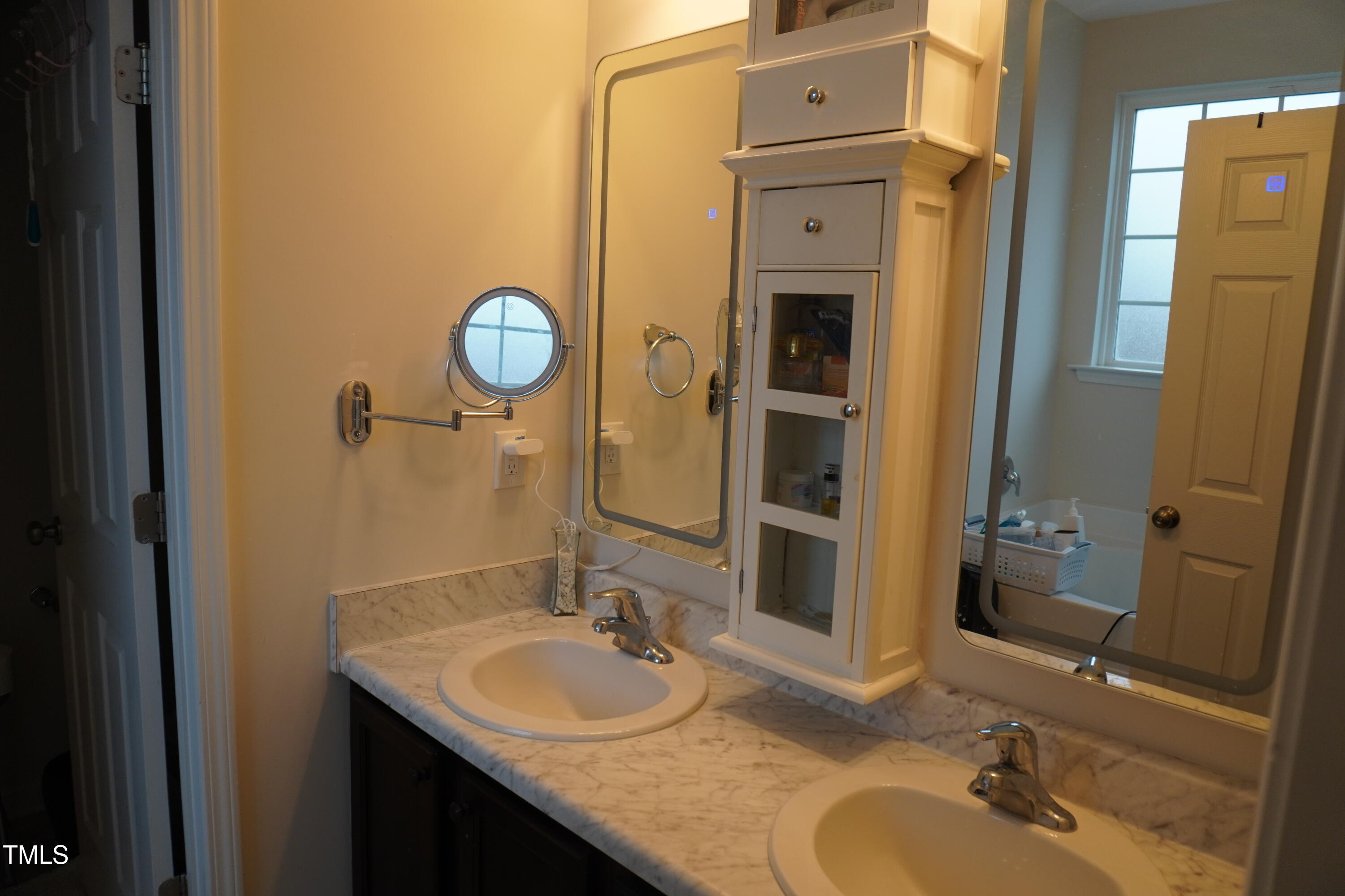 1850 Gillburg Road Henderson, NC 27537 - Photo 31 of 31 a bathroom with a granite countertop sink and a mirror