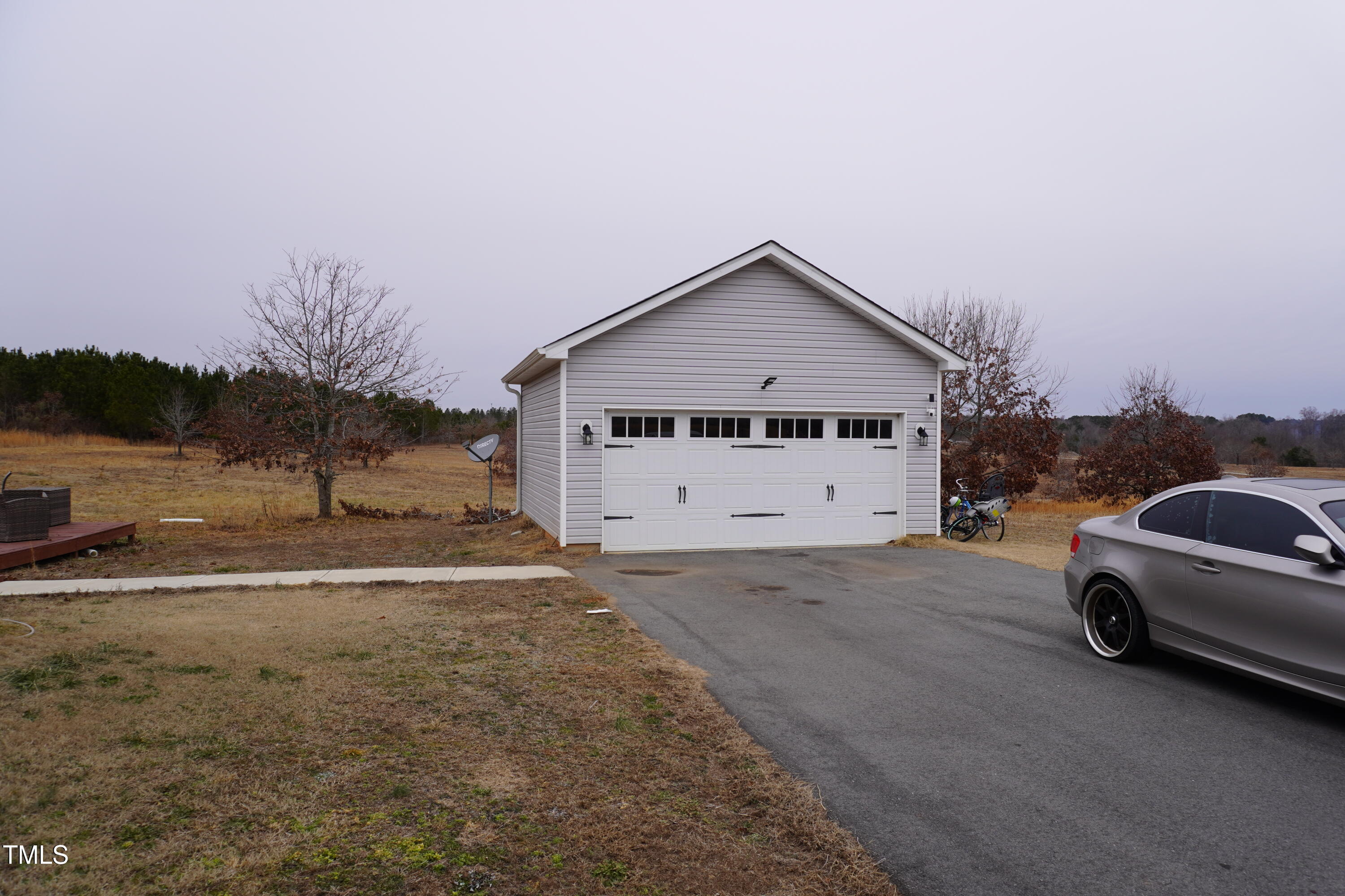 1850 Gillburg Road Henderson, NC 27537 - Photo 4 of 31 a view of a car in front of a house