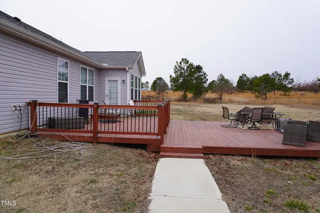 a view of a roof deck with lake view