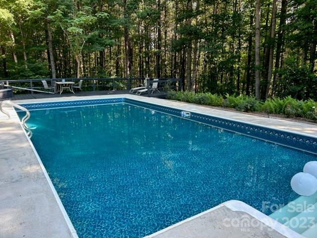2955 Alpine Lane Morganton, NC 28655 - Photo 11 of 48 a view of a backyard with a lake view