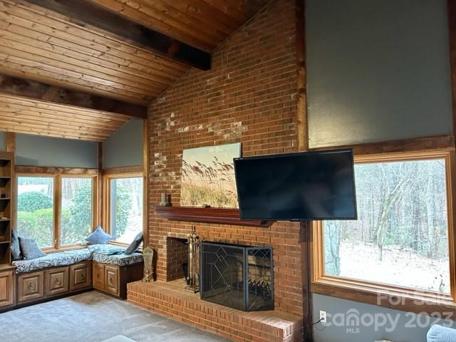 2955 Alpine Lane Morganton, NC 28655 - Photo 15 of 48 a living room with furniture a flat screen tv and a fireplace