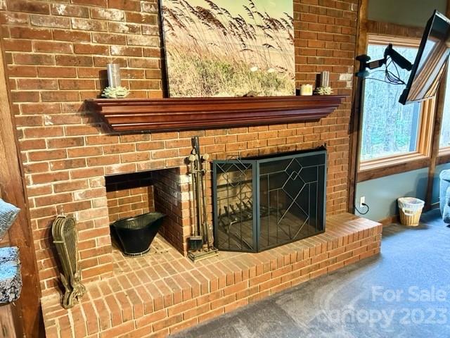 2955 Alpine Lane Morganton, NC 28655 - Photo 16 of 48 a view of a fireplace with a balcony
