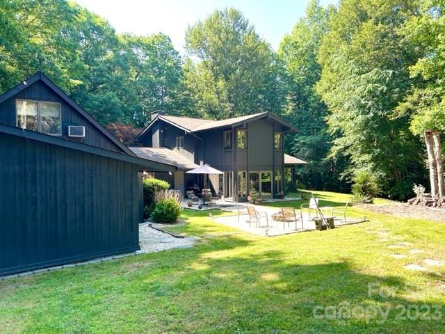 2955 Alpine Lane Morganton, NC 28655 - Photo 2 of 48 a view of a house with pool and sitting area