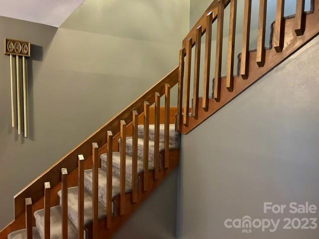 2955 Alpine Lane Morganton, NC 28655 - Photo 29 of 48 a view of staircase with wooden floor and stairs