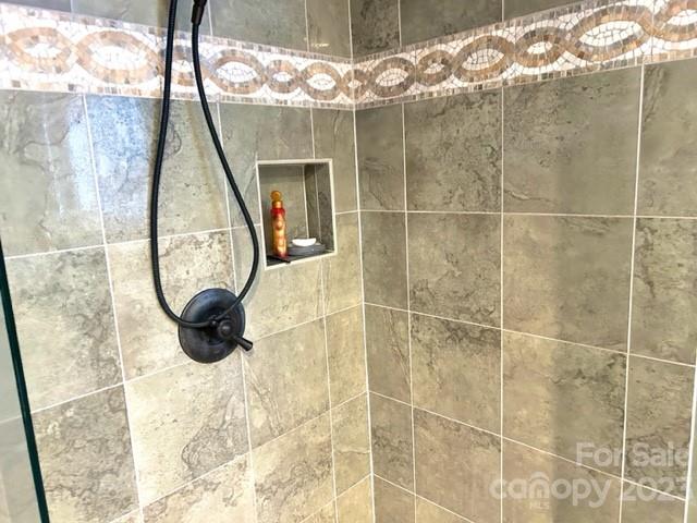 2955 Alpine Lane Morganton, NC 28655 - Photo 35 of 48 a bathroom with a sink and a mirror