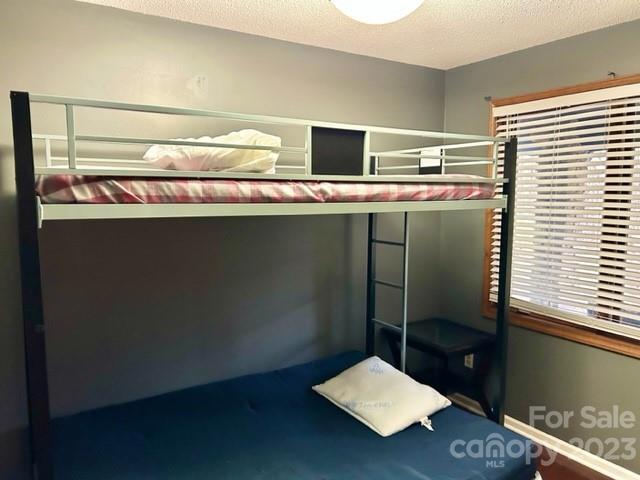 2955 Alpine Lane Morganton, NC 28655 - Photo 39 of 48 a bathroom with a sink and a mirror