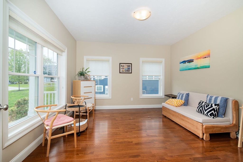 51 Tamarack Road Dracut, MA 01826 - Photo 4 of 39 a living room with furniture and a large window