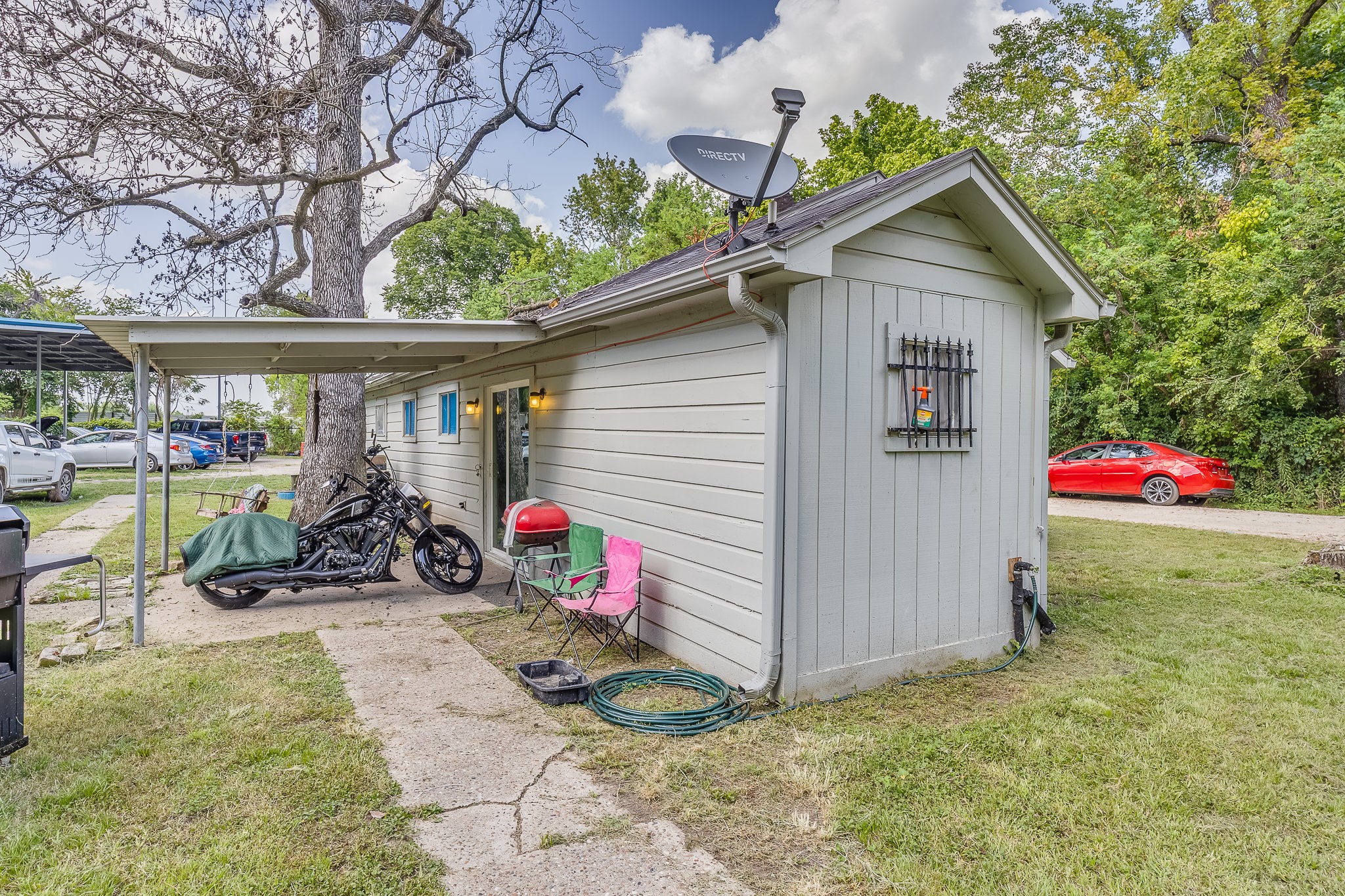 1725 Strawn Road Houston, TX 77039 - Photo 39 of 44 The rear residence provides convenient onsite living alongside the covered workshop and vehicle area.