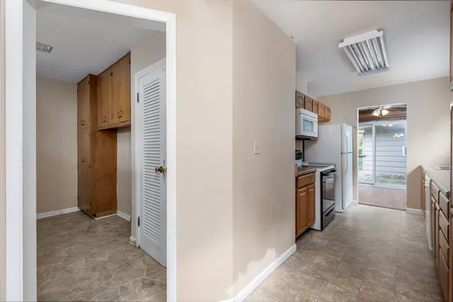 a view of livingroom with furniture and cabinet