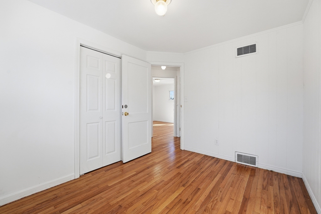 744 Bradley Road Springfield, MA 01109 - Photo 17 of 41 wooden floor in an empty room
