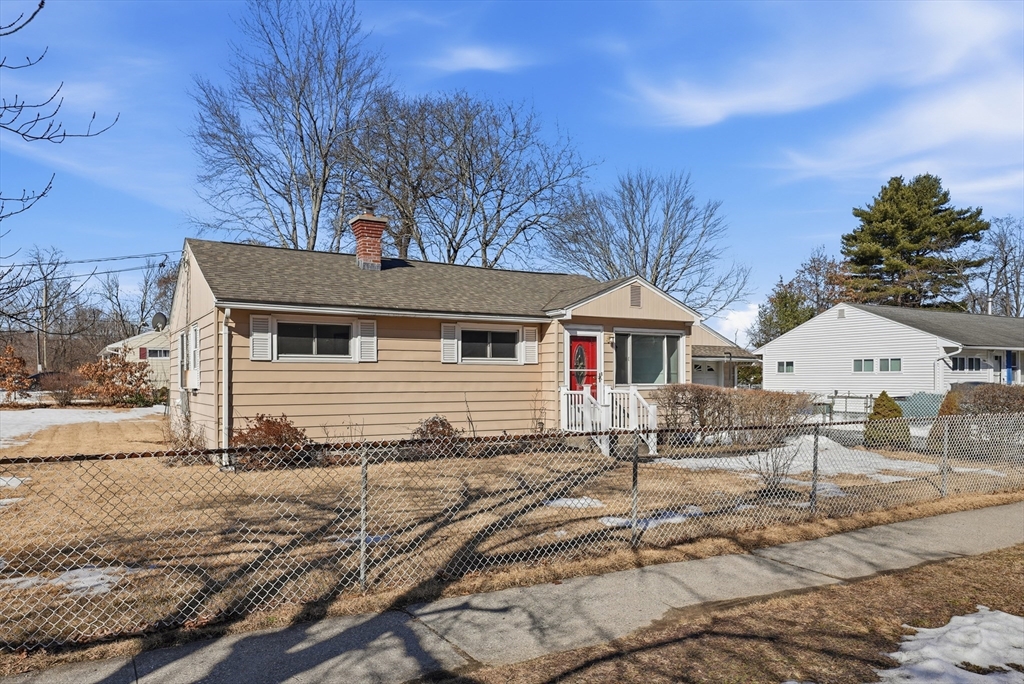 744 Bradley Road Springfield, MA 01109 - Photo 2 of 41 a white house that has a tree in front of it