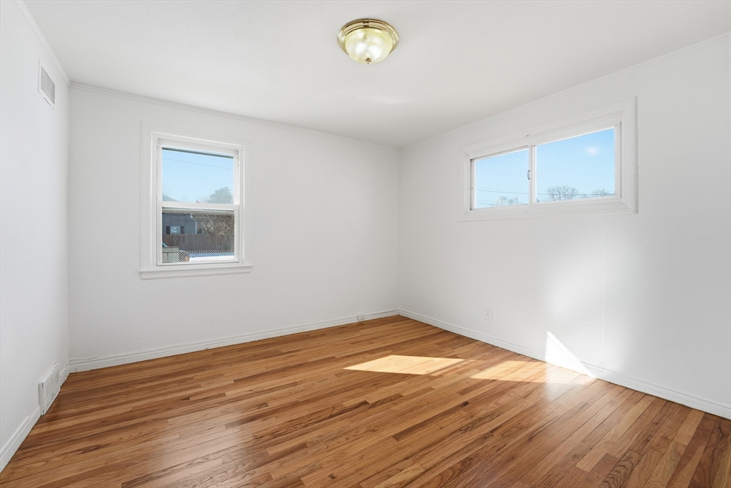 744 Bradley Road Springfield, MA 01109 - Photo 23 of 41 a view of empty room with wooden floor