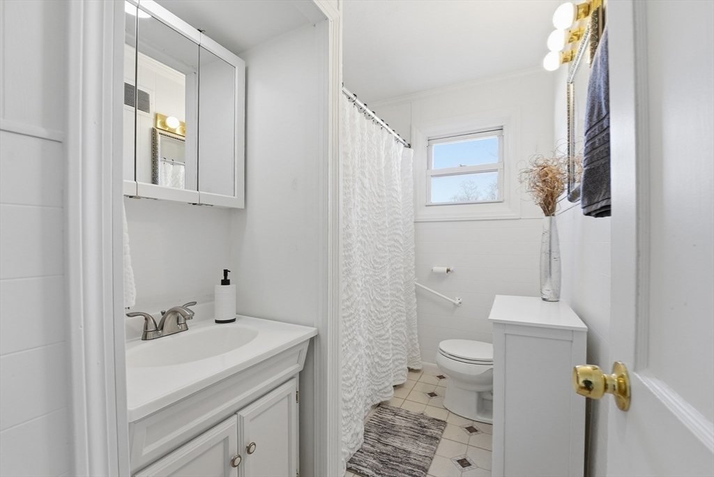 744 Bradley Road Springfield, MA 01109 - Photo 24 of 41 a bathroom with a sink toilet and shower