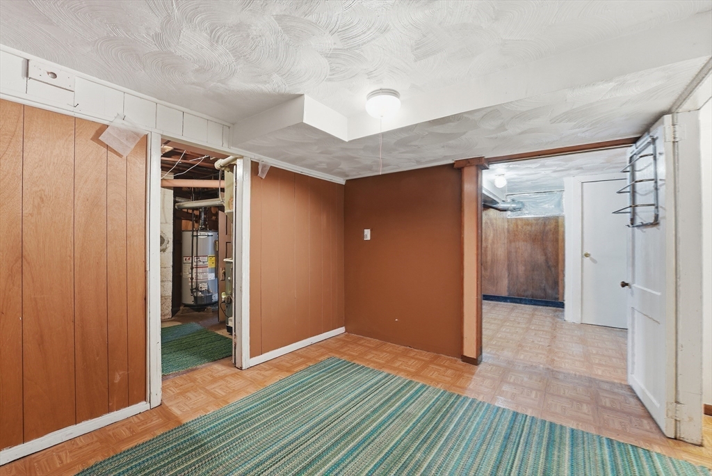 744 Bradley Road Springfield, MA 01109 - Photo 31 of 41 a view of hallway with wooden floor