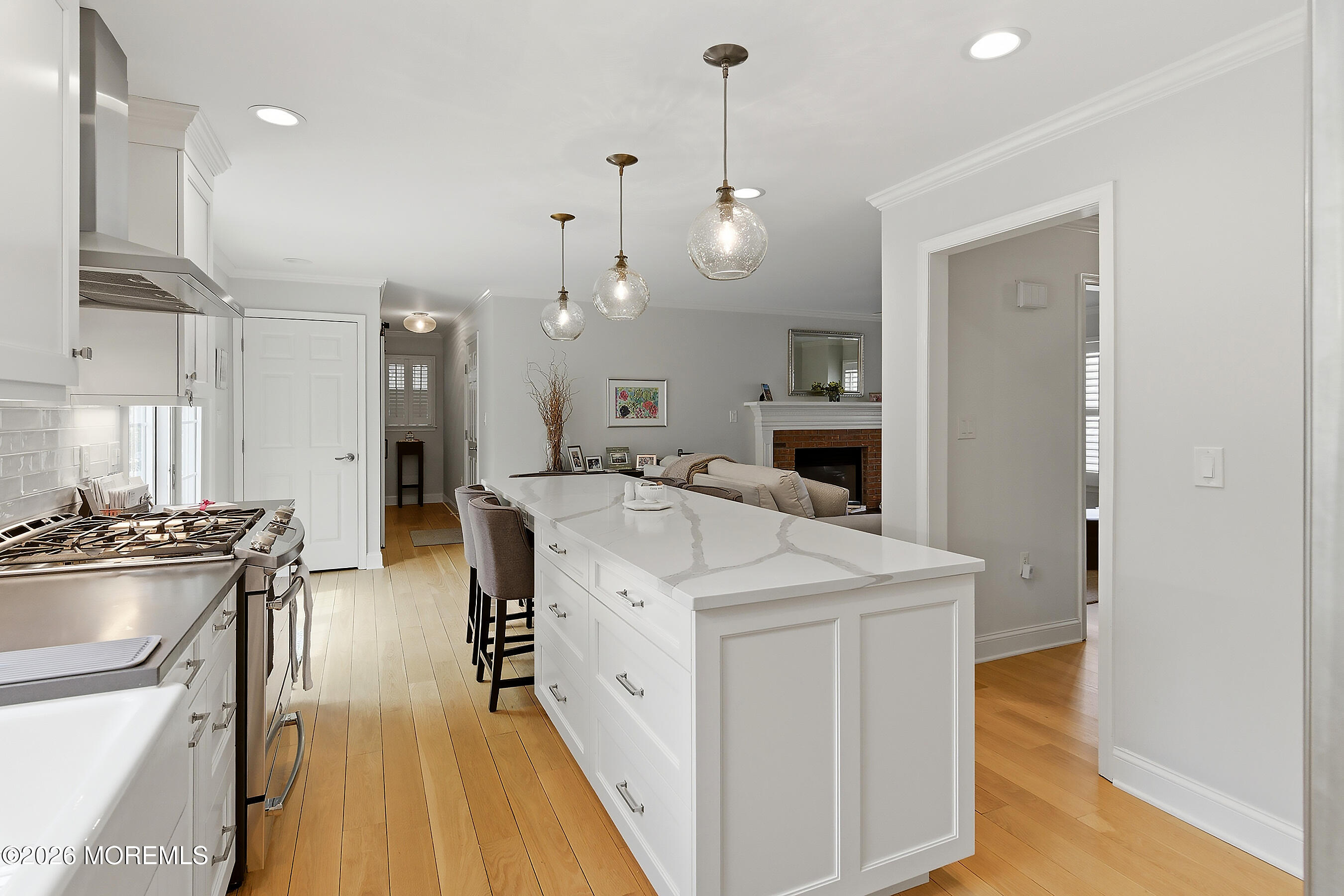 924 Ocean Road Point Pleasant, NJ 08742 - Photo 13 of 56 a large kitchen with sink stove and refrigerator