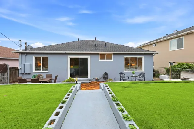 a front view of house with yard