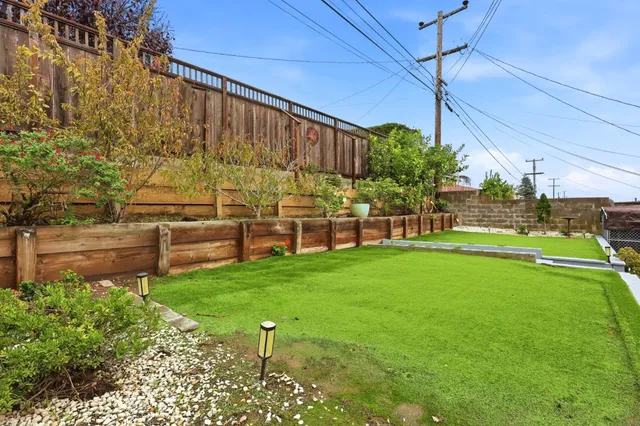 a garden view with a seating space