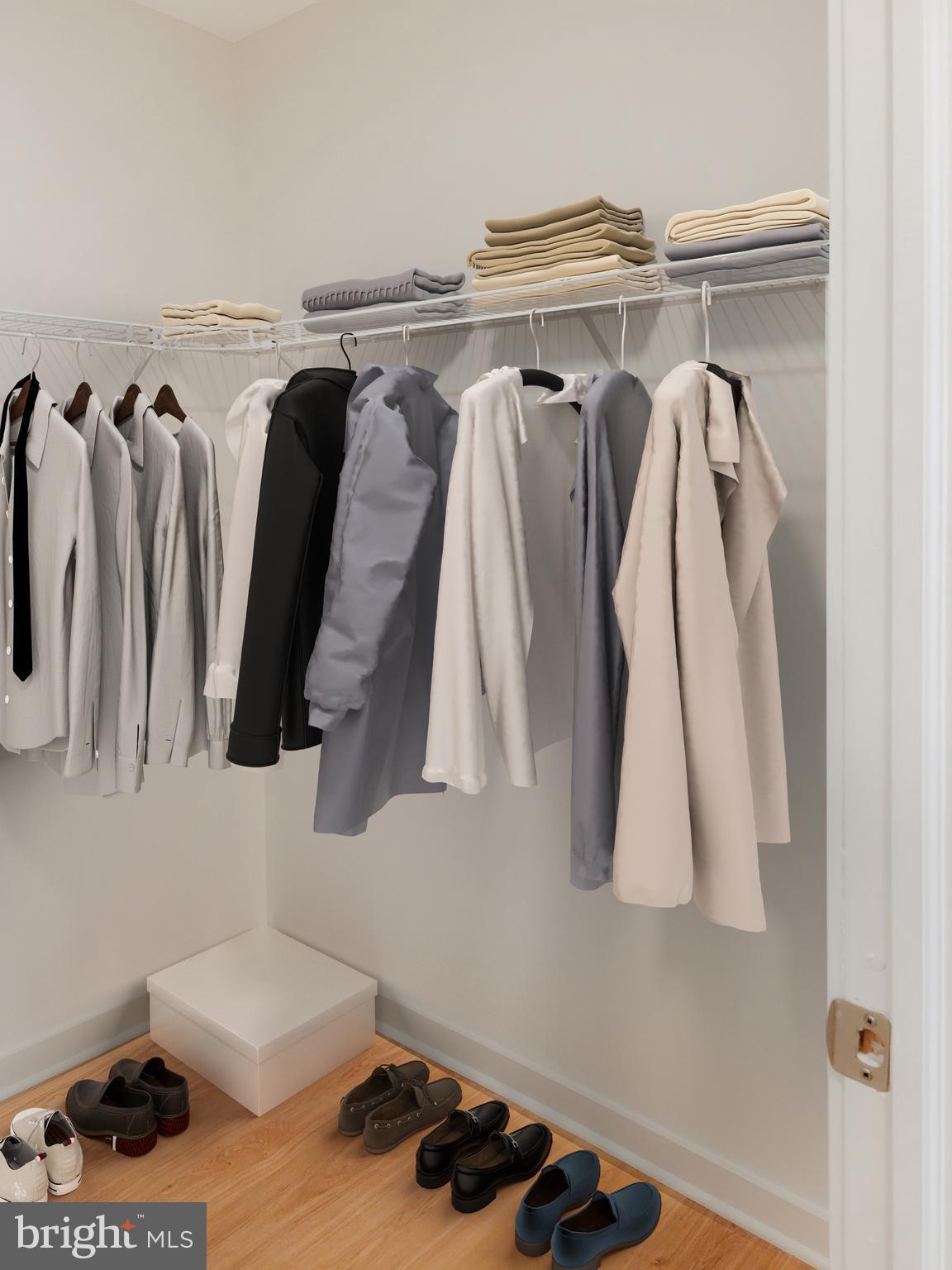 261-269 South 9th Street, Unit 504 Philadelphia, PA 19107 - Photo 13 of 27 a walk in closet with a rug