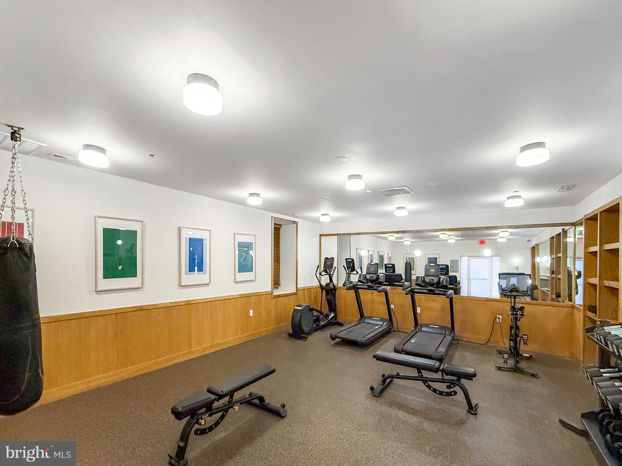 261-269 South 9th Street, Unit 504 Philadelphia, PA 19107 - Photo 23 of 27 a view of a room with gym equipment