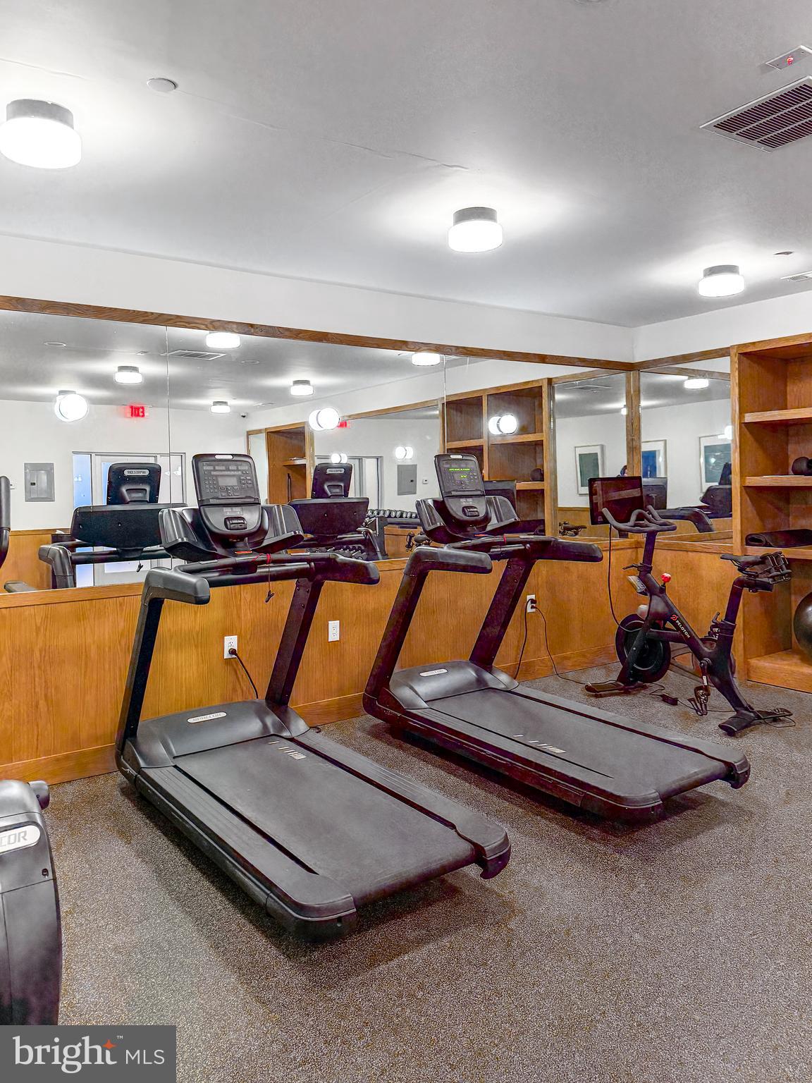 261-269 South 9th Street, Unit 504 Philadelphia, PA 19107 - Photo 25 of 27 a room with gym equipment
