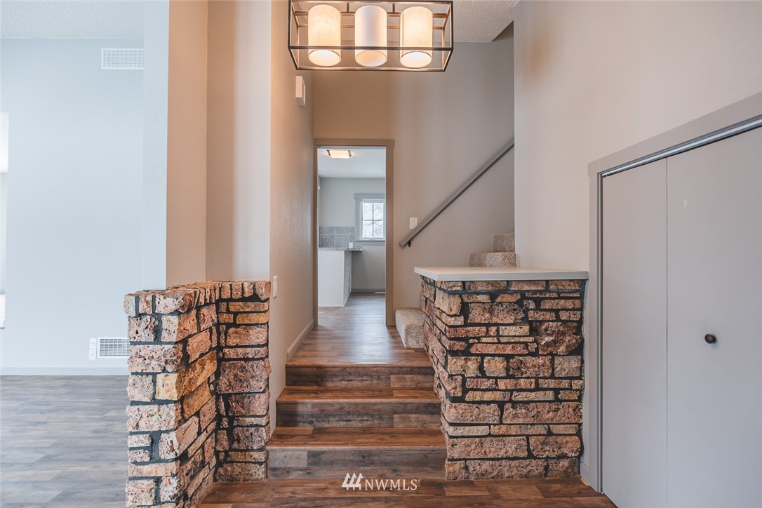 8037 Valley Road Northeast Moses Lake, WA 98837 - Photo 17 of 39 a view of entryway with wooden floor