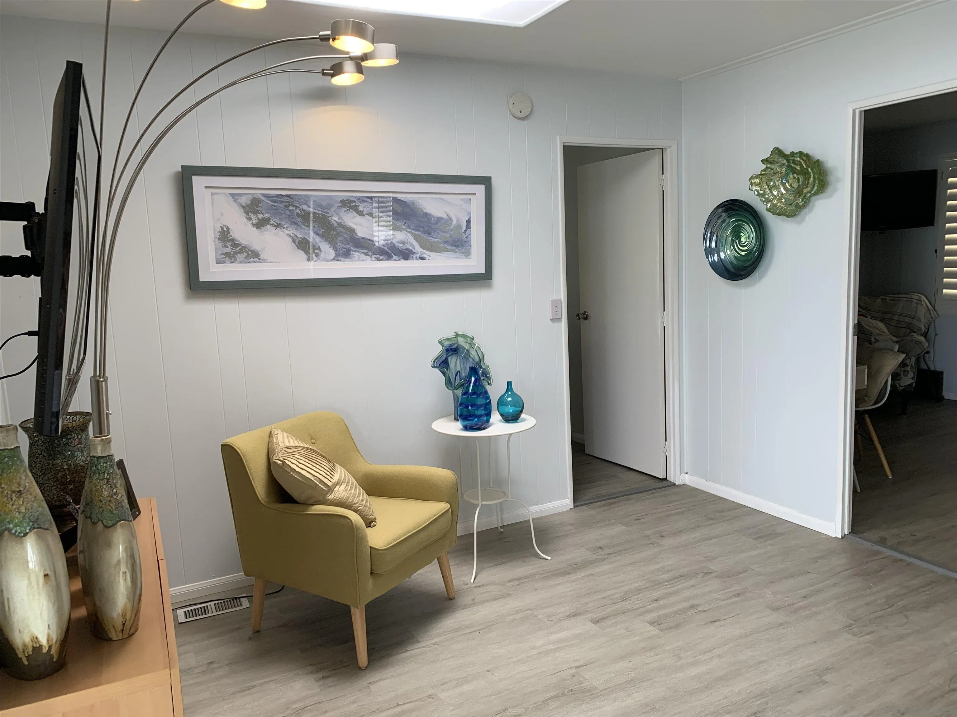 7467 Mission Gorge Road, Unit 259 Santee, CA 92071 - Photo 22 of 42 a living room with furniture and a window