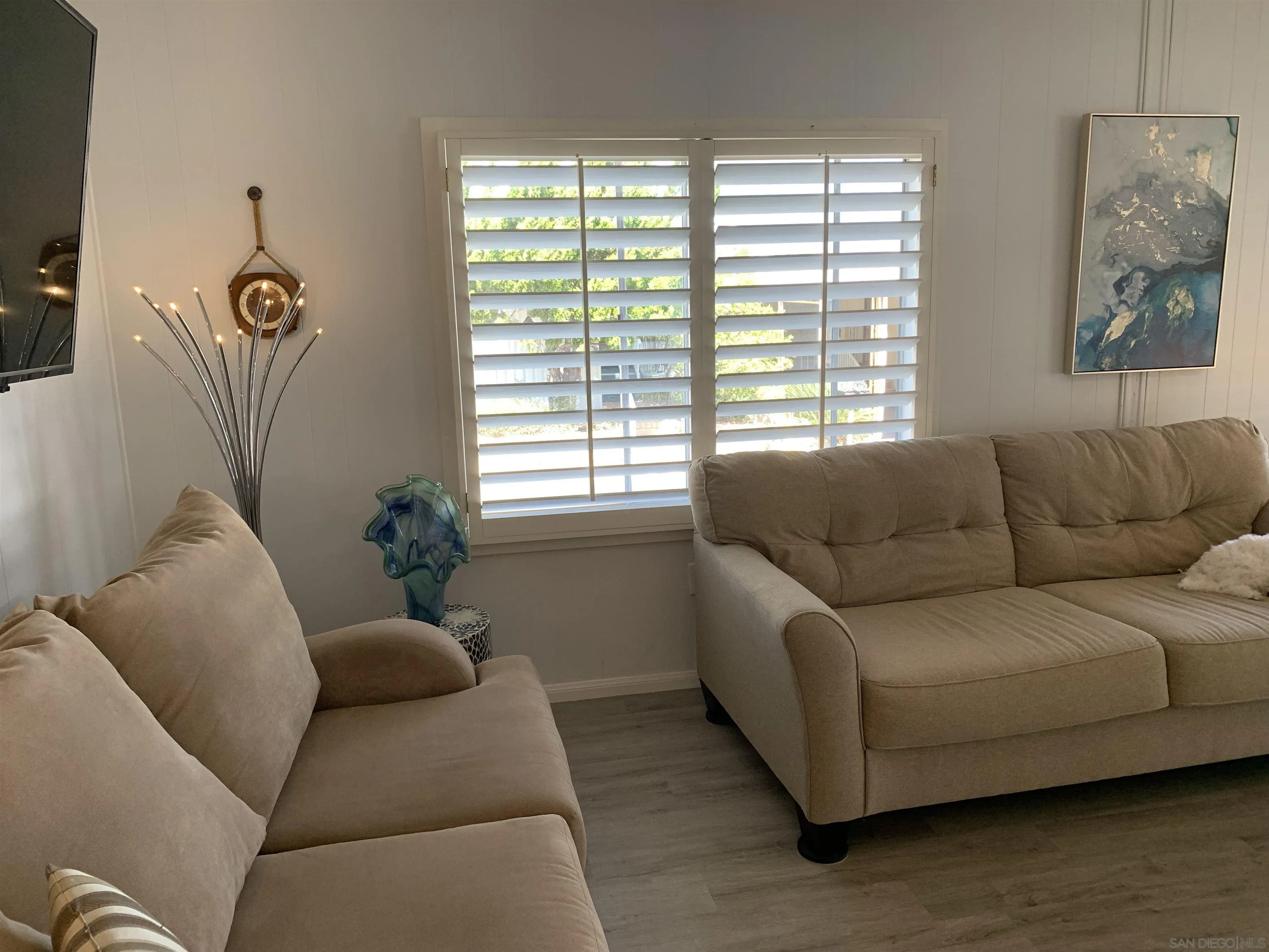 7467 Mission Gorge Road, Unit 259 Santee, CA 92071 - Photo 3 of 42 a living room with furniture and a window