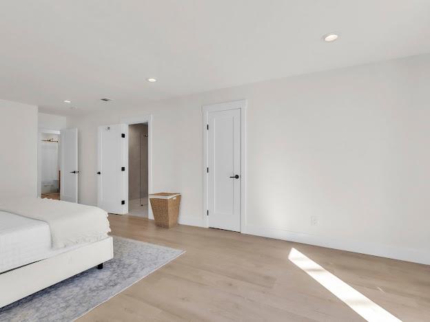 5841 Sharps Circle Carmichael, CA 95608 - Photo 14 of 38 a large bedroom with a bed and a couch