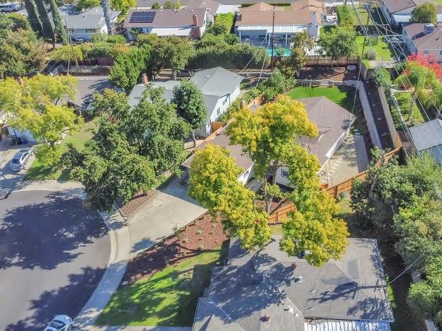 5841 Sharps Circle Carmichael, CA 95608 - Photo 33 of 38 an aerial view of a house with a garden and lake view