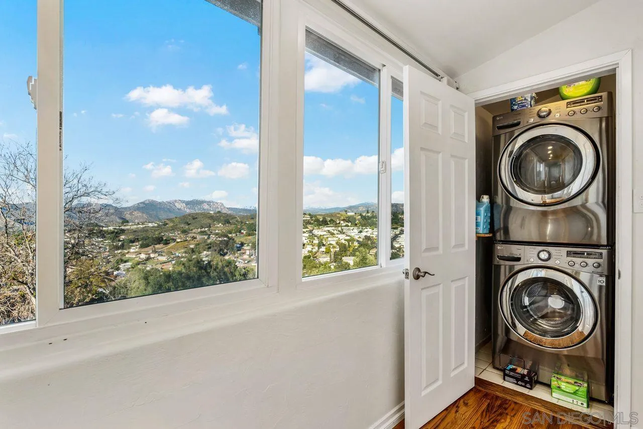 8601 Gardena Road Lakeside, CA 92040 - Photo 13 of 25 a view of a bedroom with washer and dryer