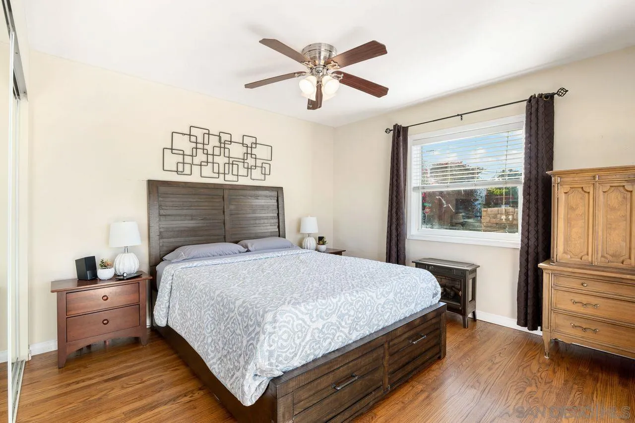 8601 Gardena Road Lakeside, CA 92040 - Photo 14 of 25 a bedroom with a bed and wooden floor