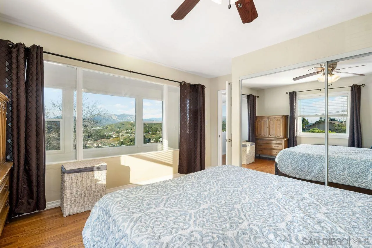 8601 Gardena Road Lakeside, CA 92040 - Photo 15 of 25 a bedroom with a bed and large window with balcony view