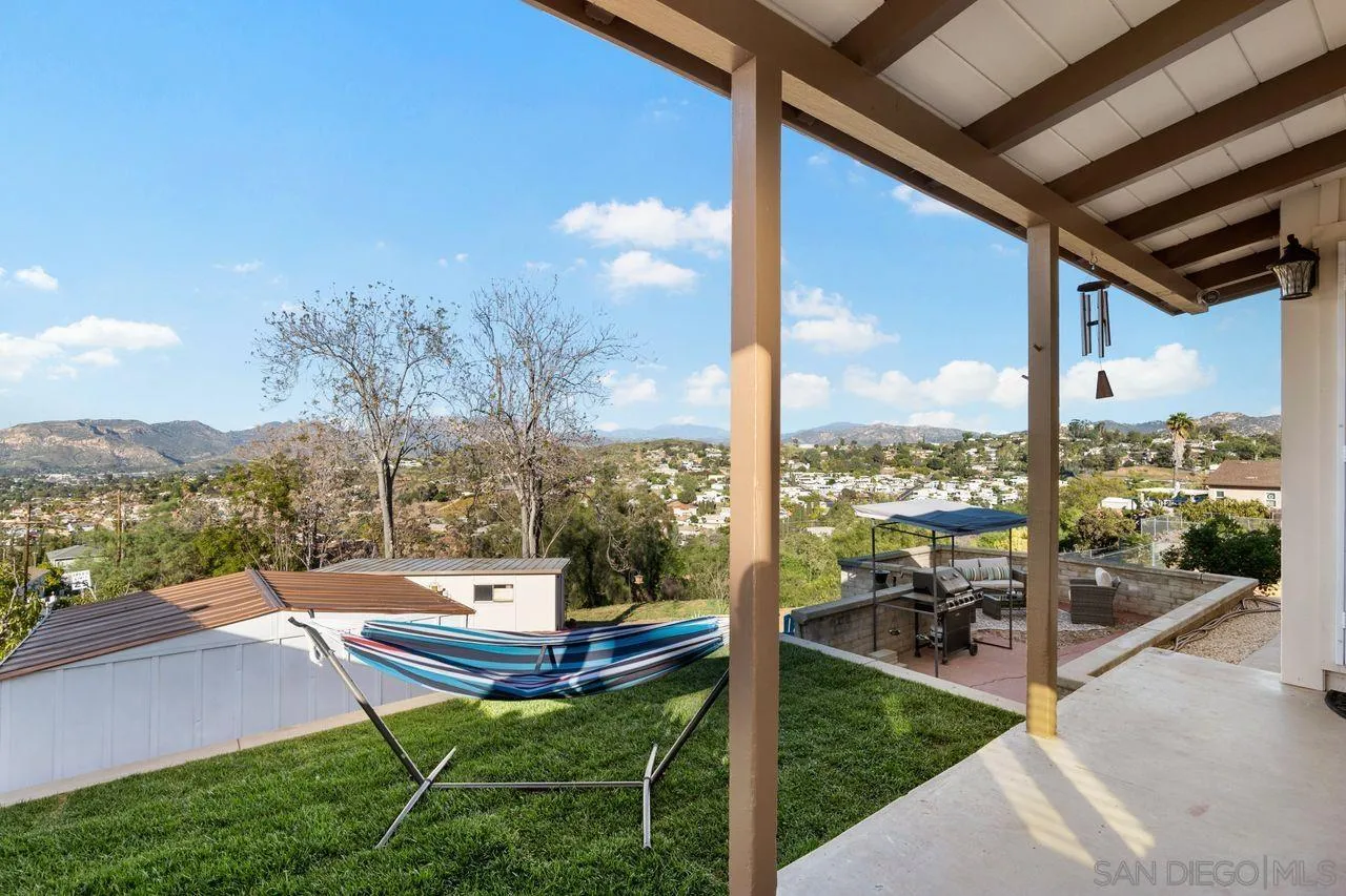 8601 Gardena Road Lakeside, CA 92040 - Photo 20 of 25 a view of a patio with a table chairs and backyard
