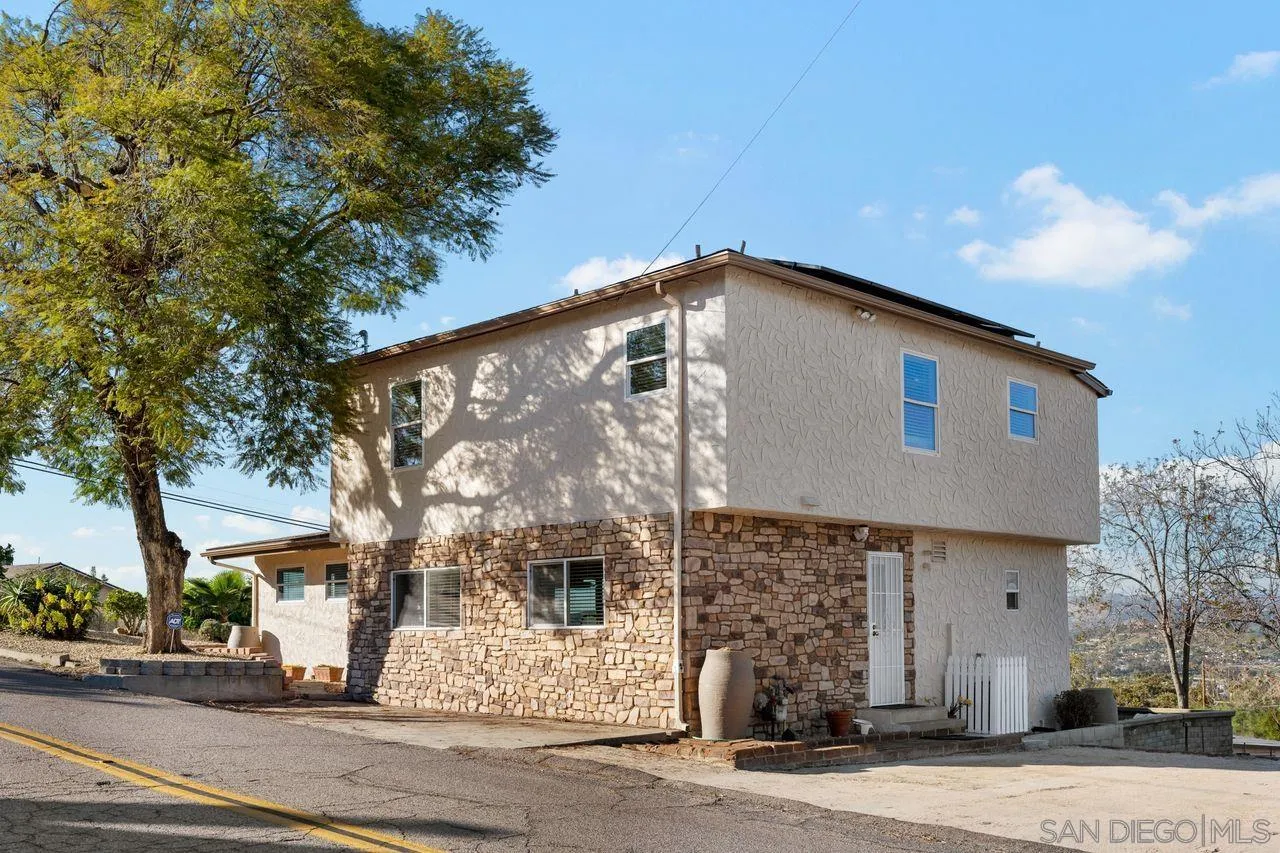 8601 Gardena Road Lakeside, CA 92040 - Photo 23 of 25 a front view of a house with a yard