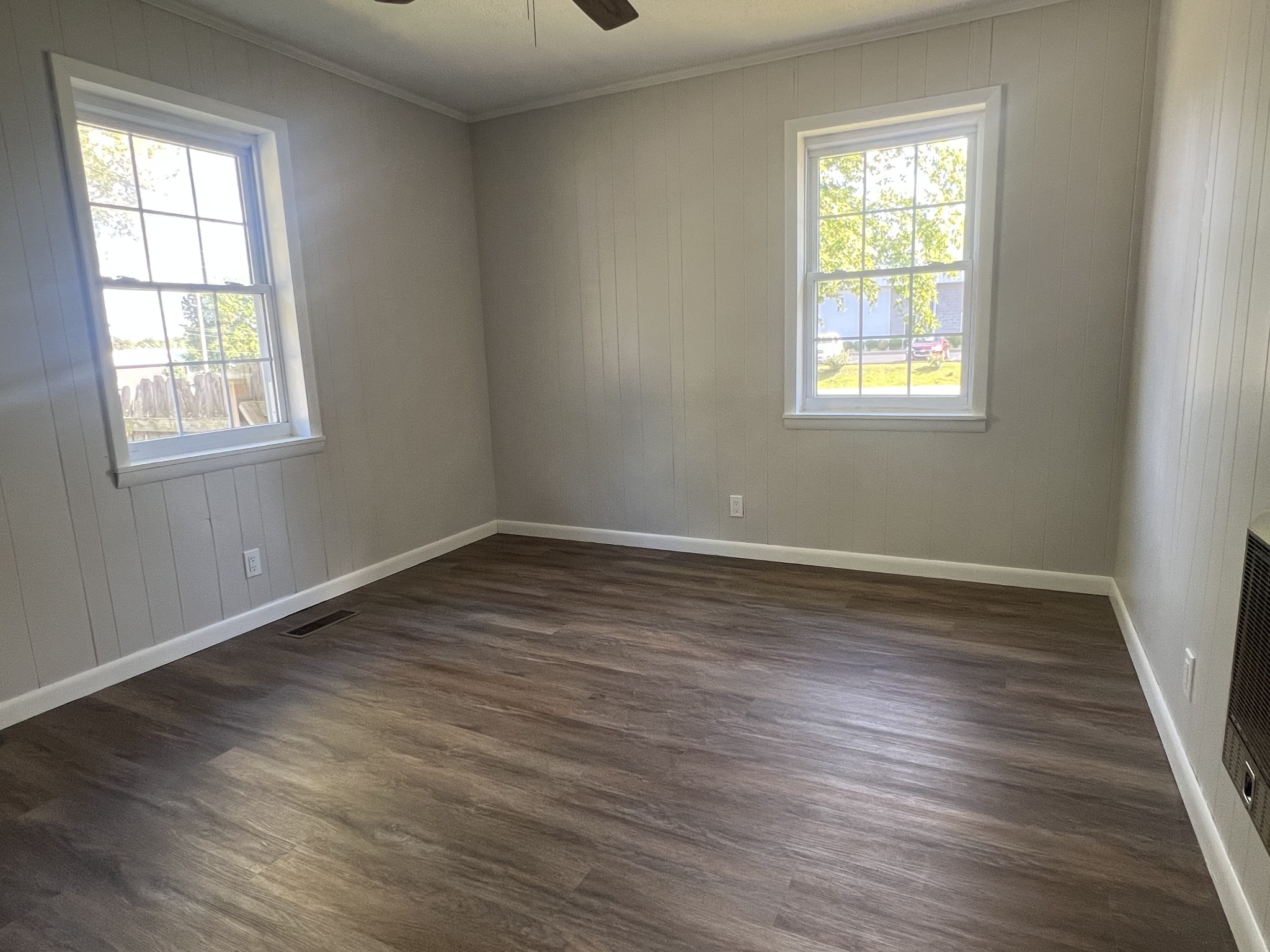 641 Coolidge Road Lafayette, TN 37083 - Photo 12 of 17 a view of an empty room with wooden floor and a window