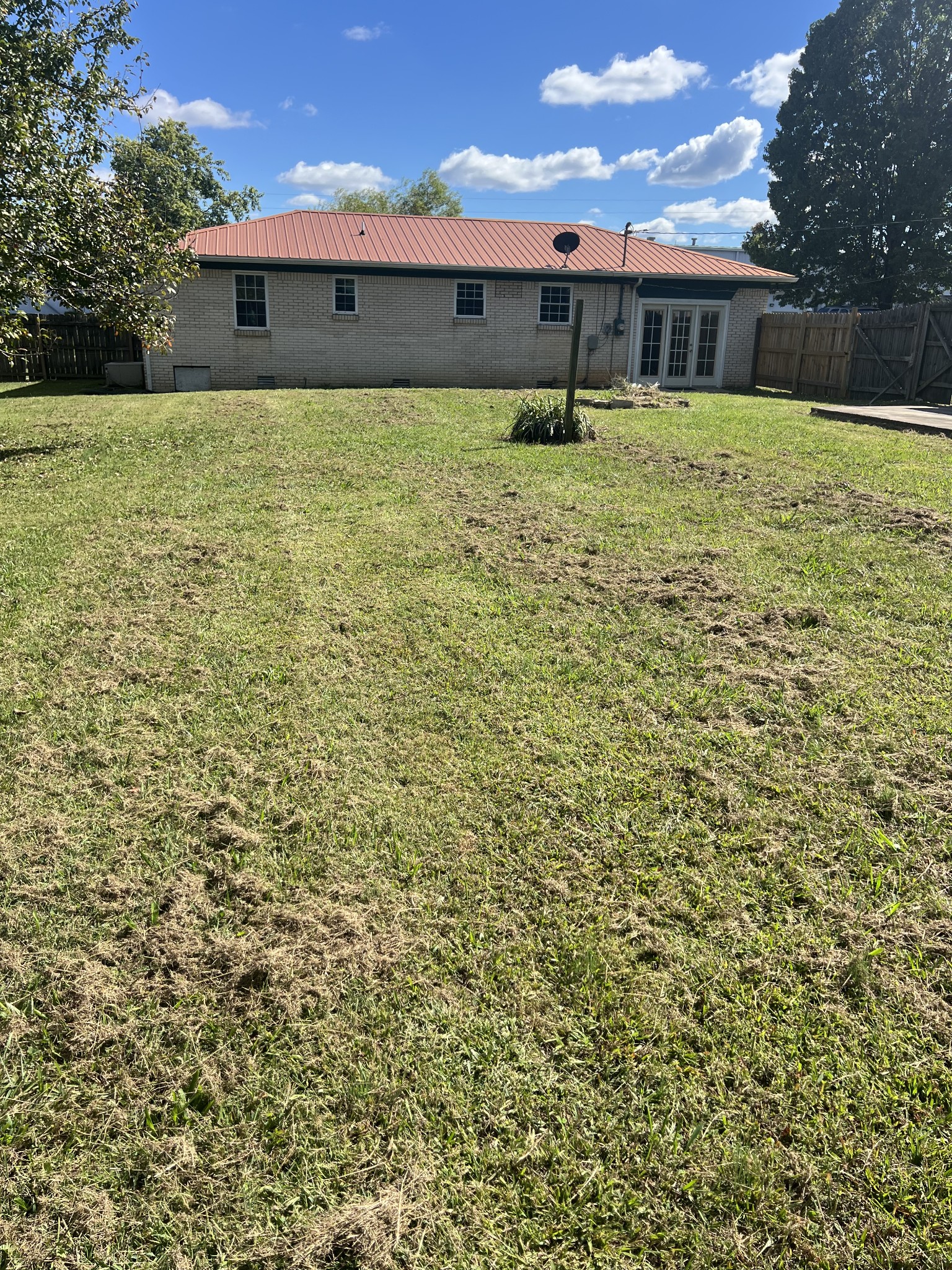 641 Coolidge Road Lafayette, TN 37083 - Photo 3 of 17 a front view of a house with a yard