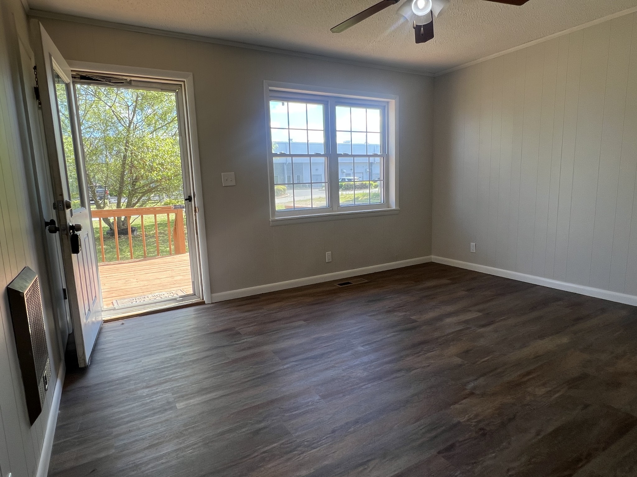 641 Coolidge Road Lafayette, TN 37083 - Photo 8 of 17 wooden floor in an empty room with a window