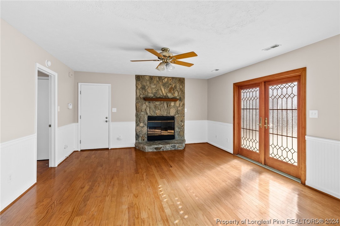 1030 Rim Road Fayetteville, NC 28314 - Photo 20 of 33 wooden floor in an empty room with a window