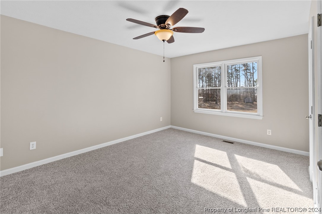 1030 Rim Road Fayetteville, NC 28314 - Photo 23 of 33 a view of an empty room with a window