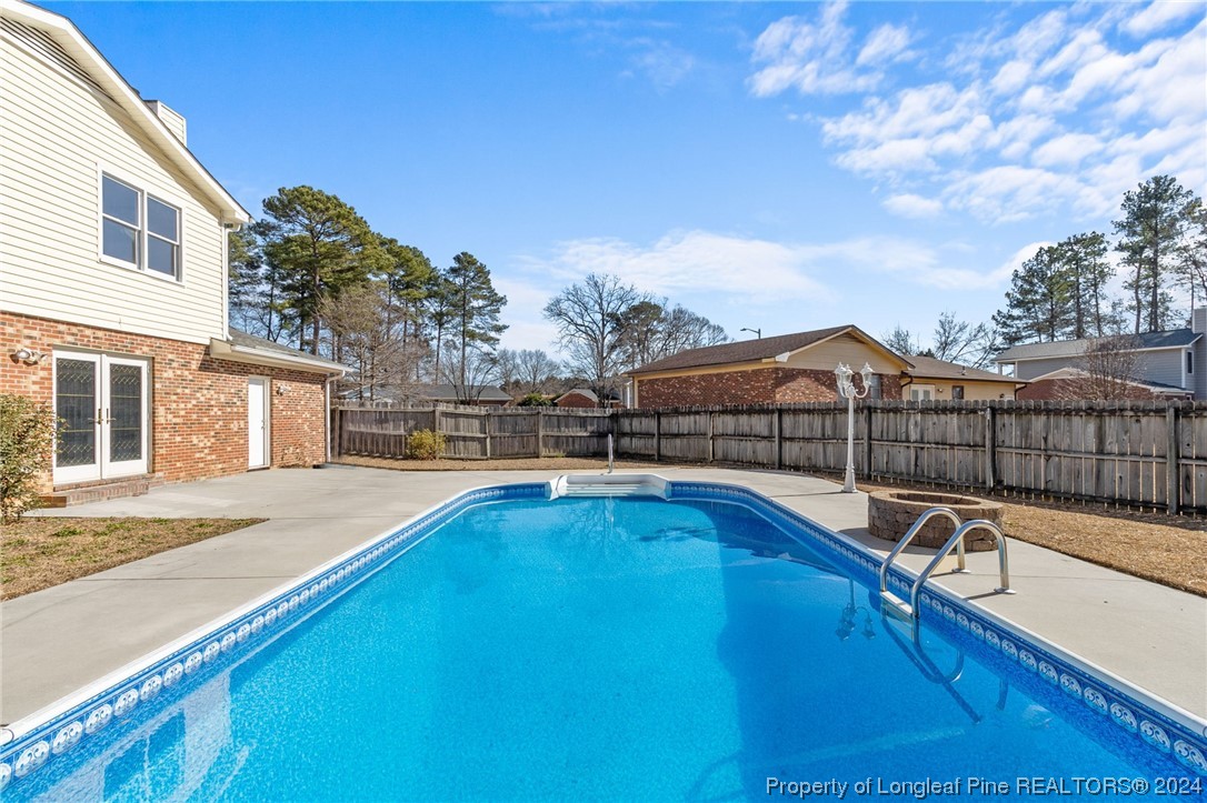 1030 Rim Road Fayetteville, NC 28314 - Photo 33 of 33 a view of a house with swimming pool