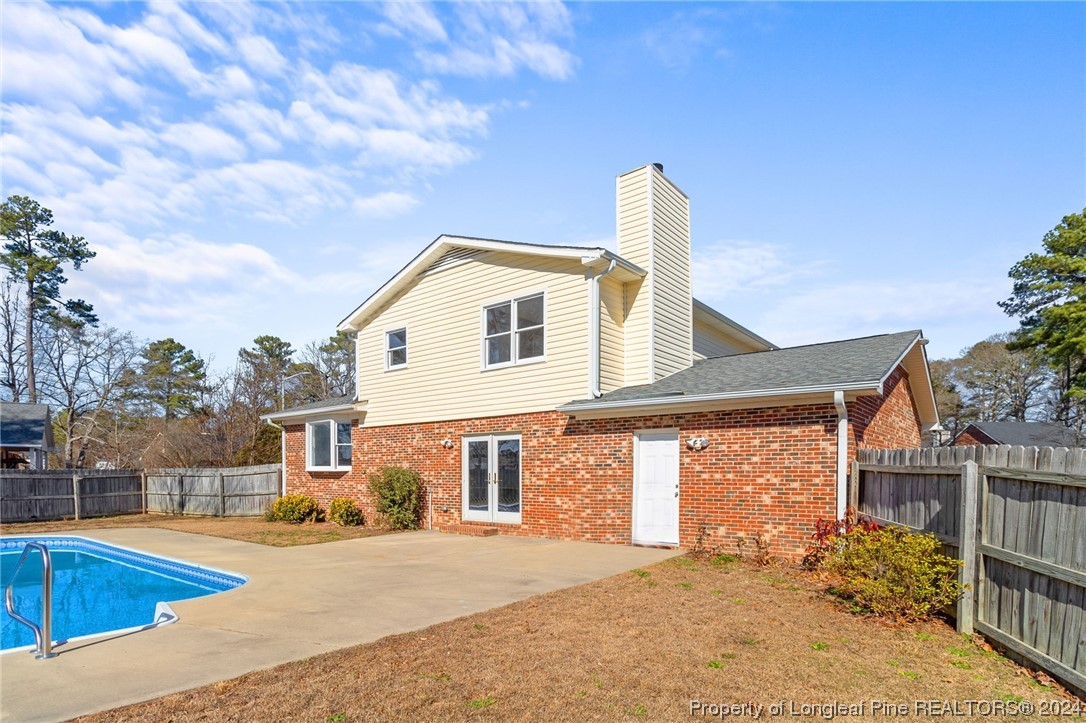 1030 Rim Road Fayetteville, NC 28314 - Photo 4 of 33 a front view of a house with a yard