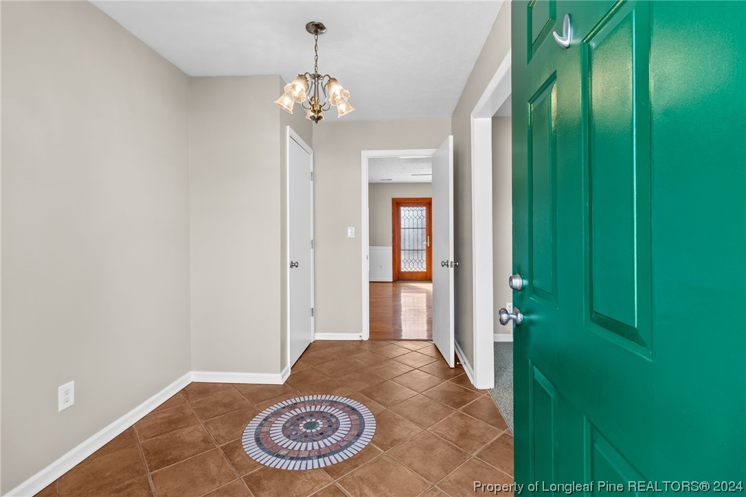 1030 Rim Road Fayetteville, NC 28314 - Photo 6 of 33 a view of a hallway with entryway